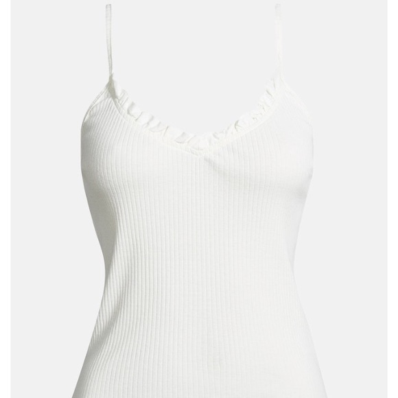 I am selling a cream tank top! Never been worn. - Picture 1 of 1